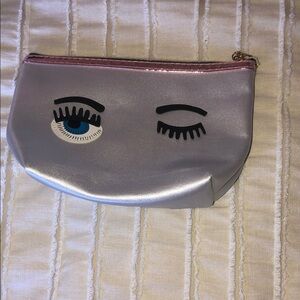 2 chic silver with  Eye wink Clutch